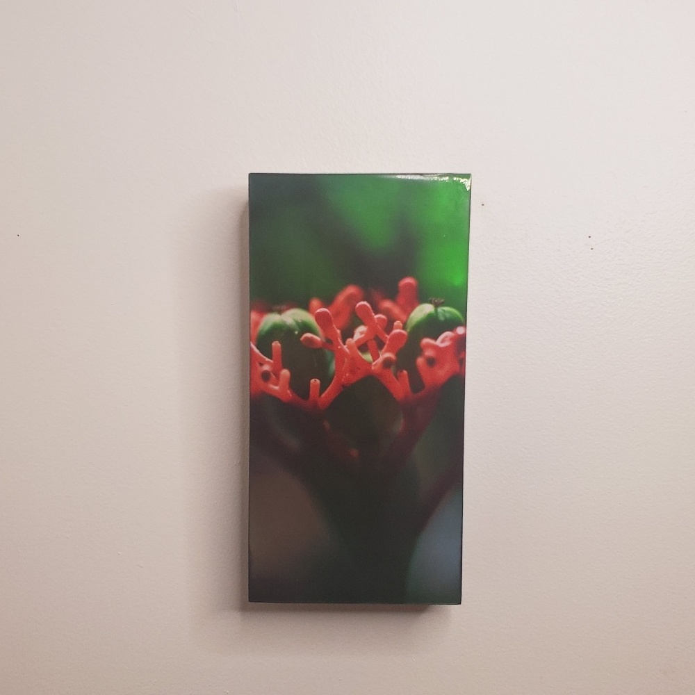 Glossy wrapped block wall art.
